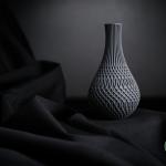 Inflect Vase – Moderne Designvase mit fließender Geometrie