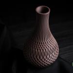 Inflect Vase – Moderne Designvase mit fließender Geometrie